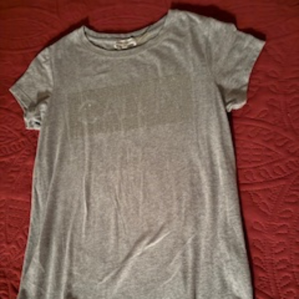Calvin Klein, gray shirt with embellished Calvin on front, size xs , fits s/m